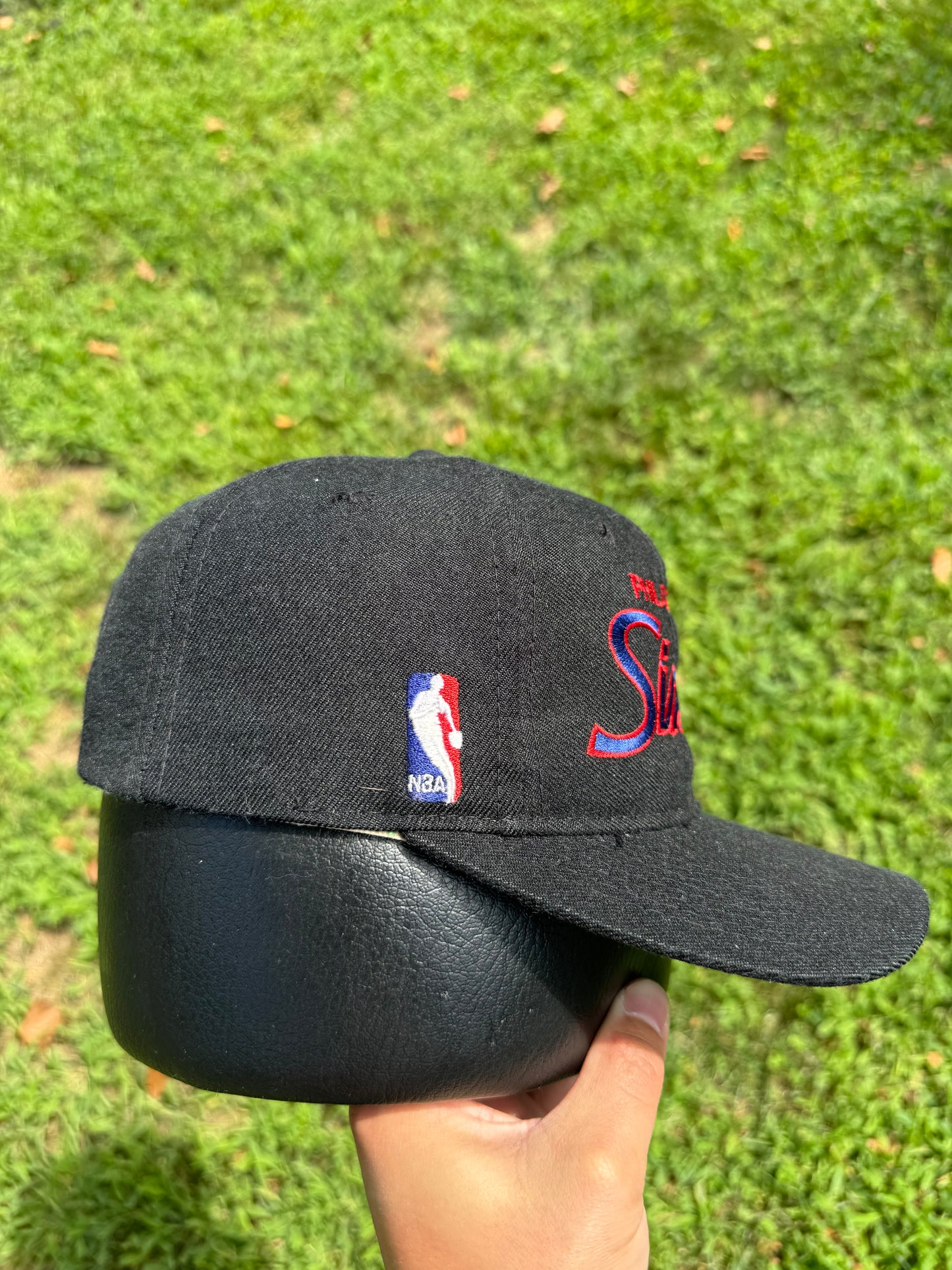 Vintage Philadelphia 76ers sports specialties black script hat